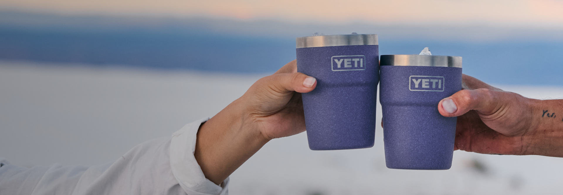 Yeti Moon Dust Australia two hands with stackable tumblers,